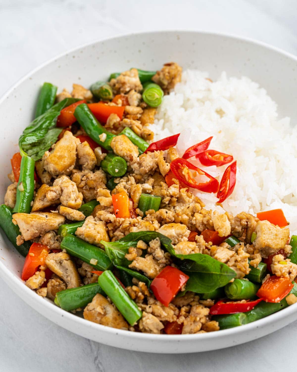 Thai basil tofu pad kra pao on a plate.