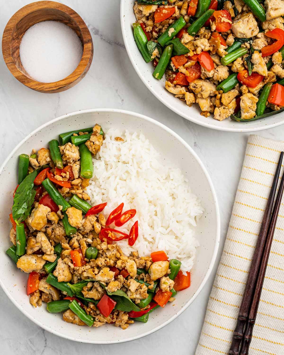 Thai basil tofu pad krapow on a plate with rice.