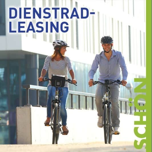 Zwei Fahrradfahrer in Gau-Algesheim bei schönem Wetter.