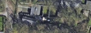 Fernes Luftbild der Sebastianus & Afra Schützenbruderschaft in Köln, zeigt die historische Veranstaltungshalle im Grünen.