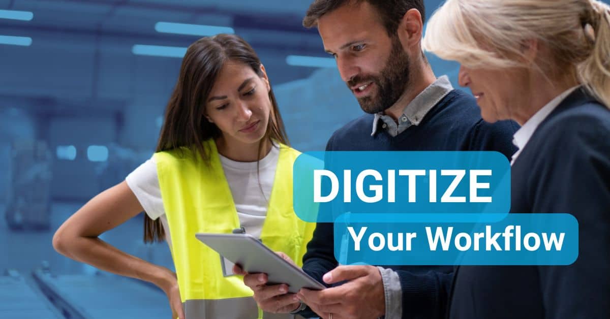 Two professionals reviewing digital workflow and automation solutions on a screen.