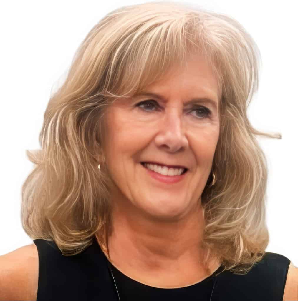 Sheri Davenport smiling, showcasing confidence and warmth, in a professional setting.