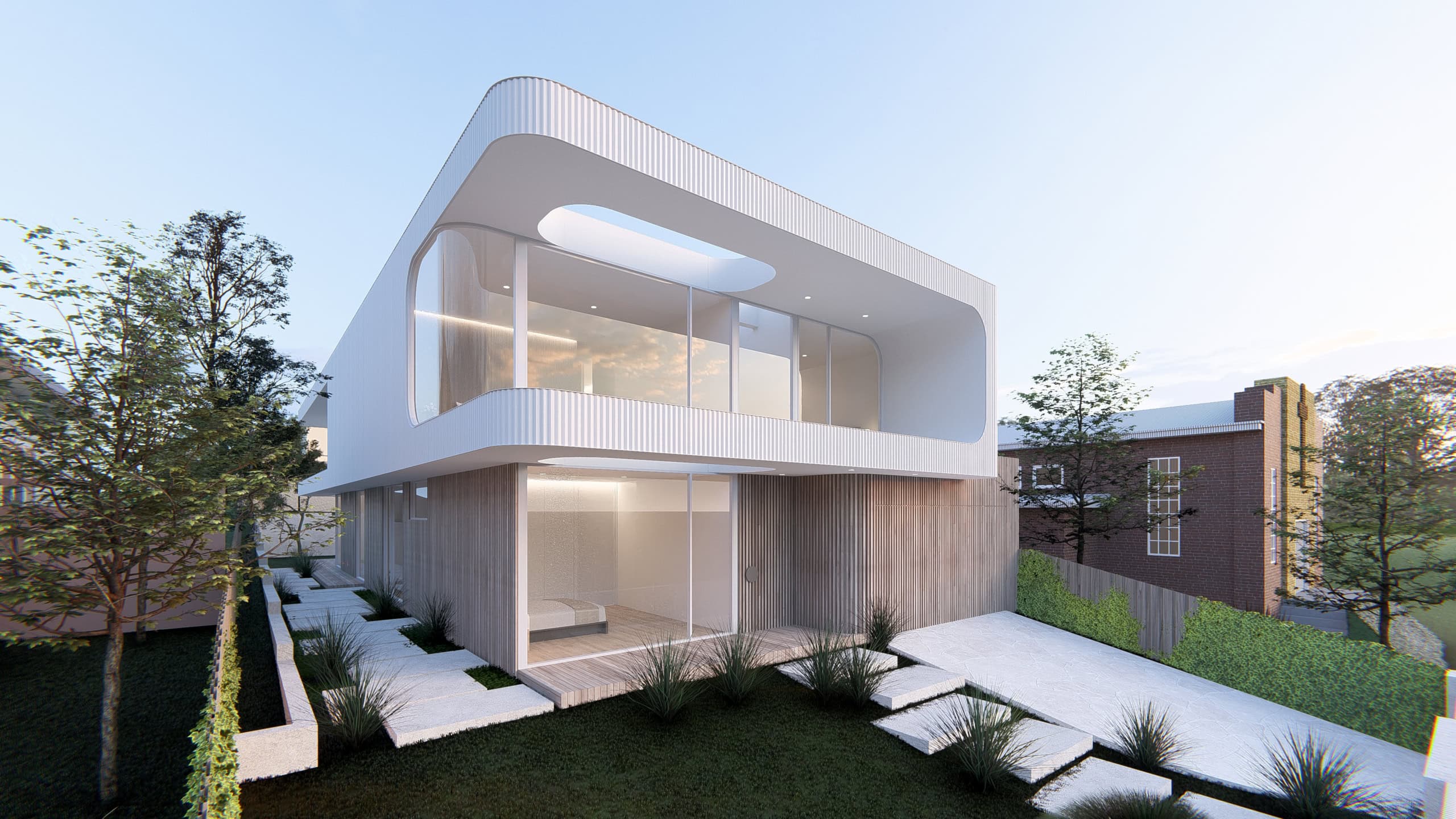 Sleek modern house design with curved white facade and extensive glass windows.