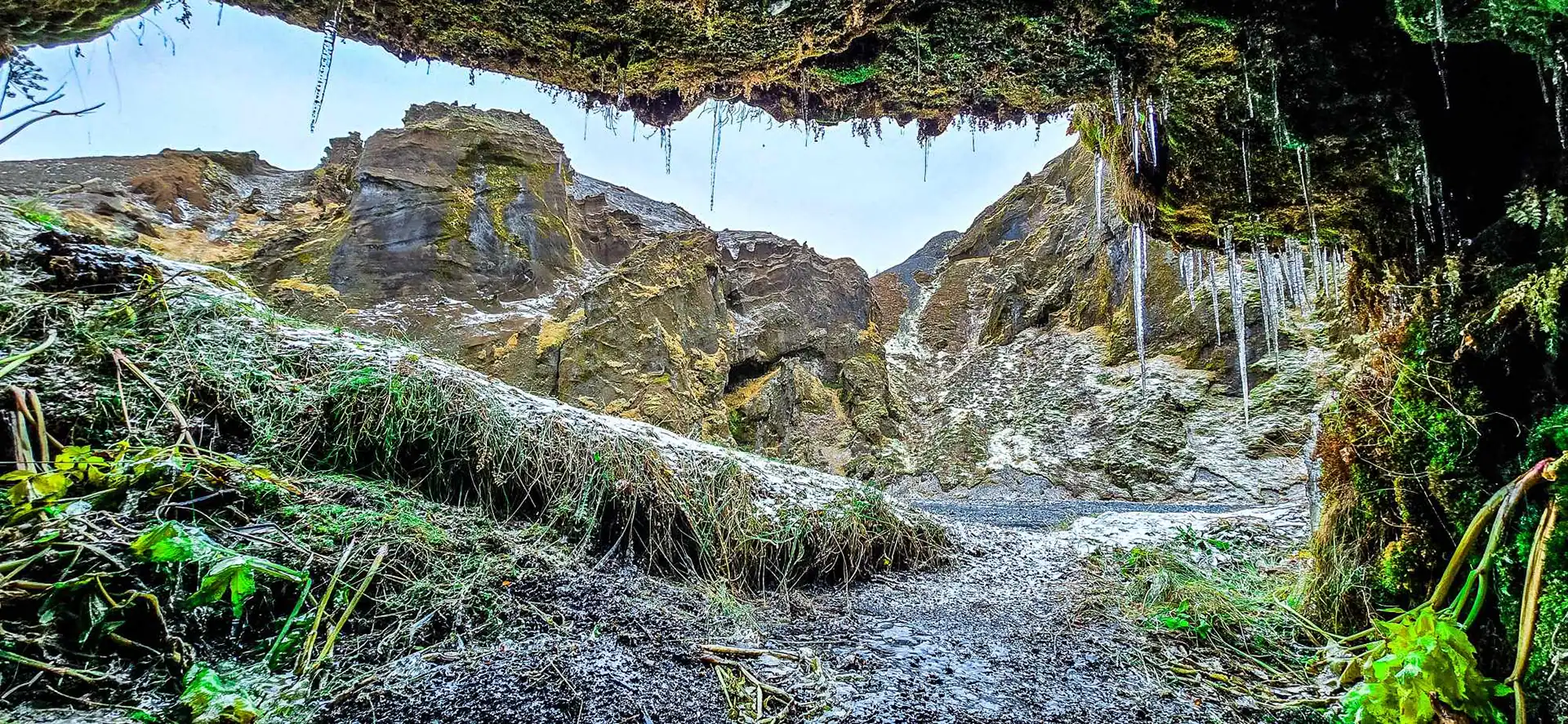 A viewpoint from a small cave where you see icelandic nature