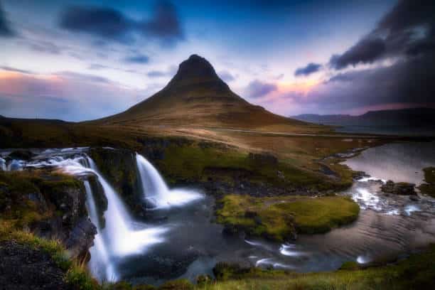 At 463 meters high, Kirkjufell mountain is one of the essential places to see in Snaefellsnes. Its location on the seashore and its curious, almost perfect conical shape have made Kirkjufell, “the church mountain”, the most photographed landscape in Iceland.