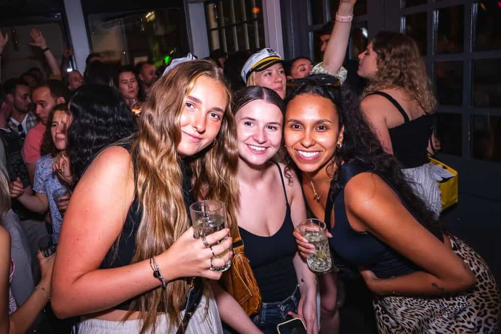 St Christopher's Inn London Bridge - The Inn social space with people enjoying drinks and music.