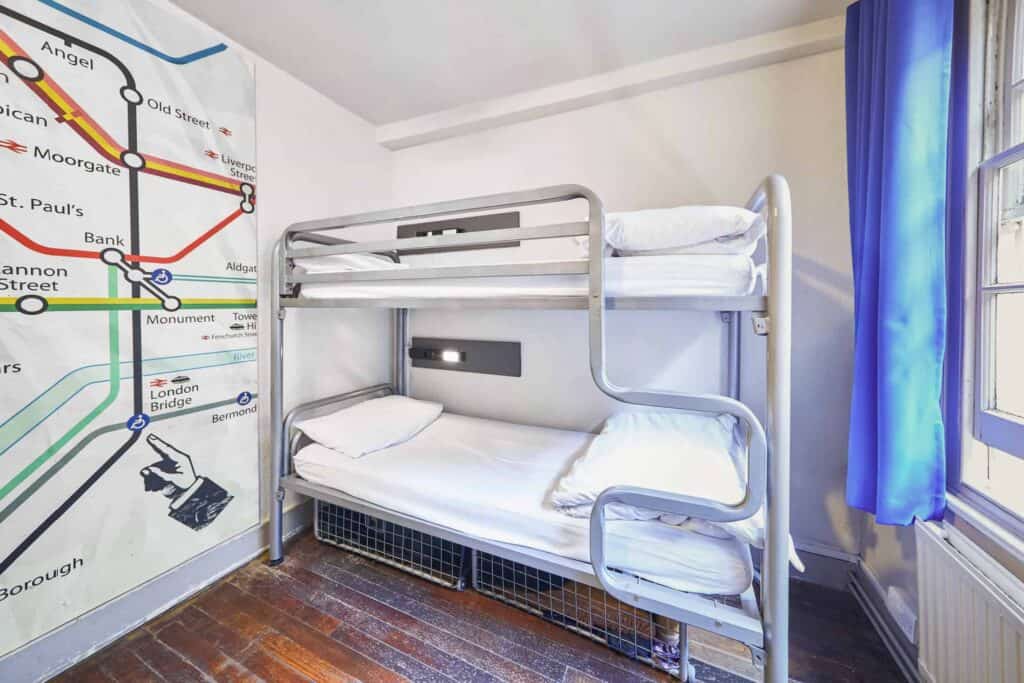 St Christopher's Inn London Bridge - The Inn bunk bed room with a map wall and window.