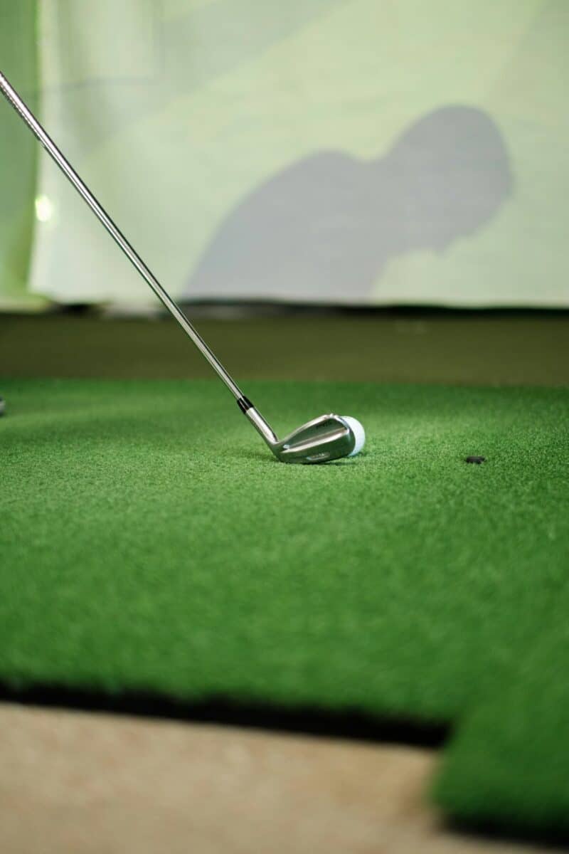 St Christopher's Inn London Bridge - The Inn, golf putting green scene with club and ball.