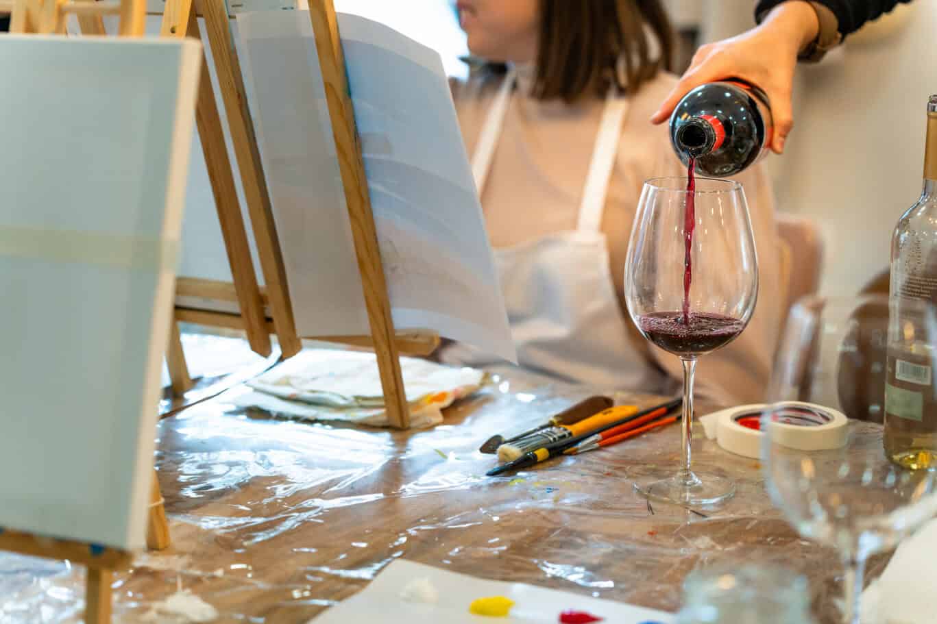 St Christopher's Inn London Bridge - The Inn, art class scene with a person pouring wine.