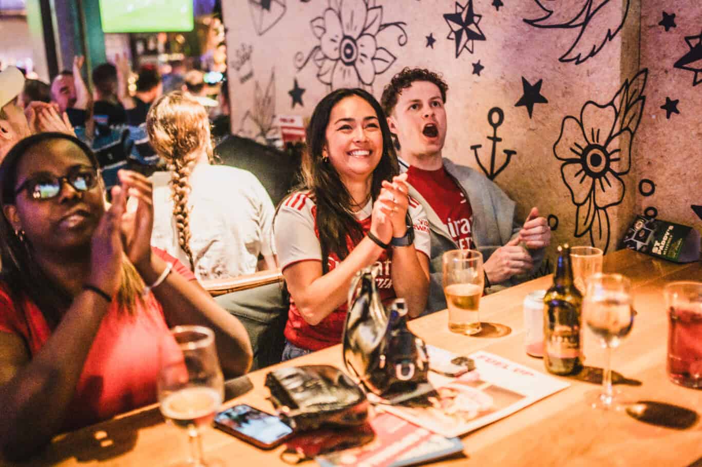 Guests having fun at London Bridge Village Hostel bar.