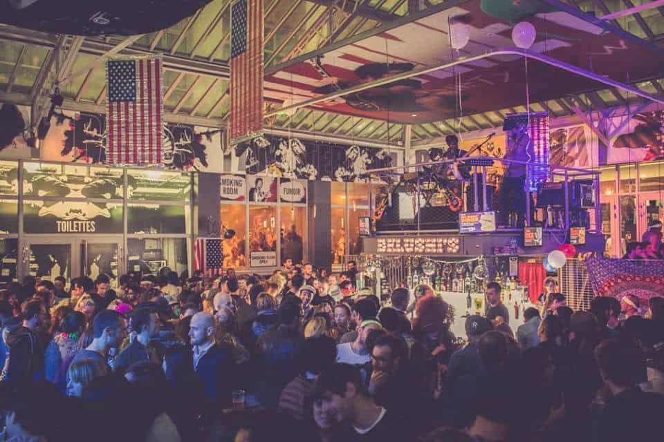 Vibrant nightlife scene at St Christopher’s Gare du Nord hostel in Paris.
