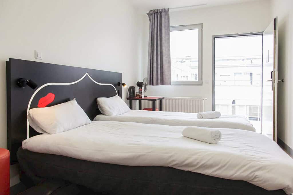 Modern twin bedroom at St Christopher’s Hostel near Gare du Nord, Paris.