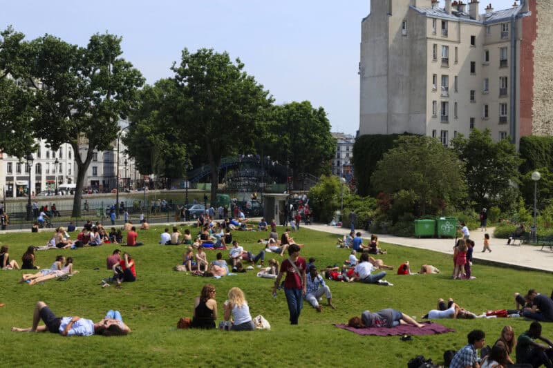 people relaxing at Jardin Villemin in Paris