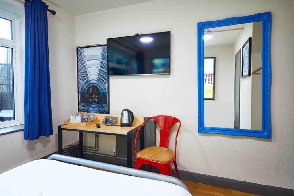 Modern private en suite room at St Christopher's Shepherd's Bush hostel.