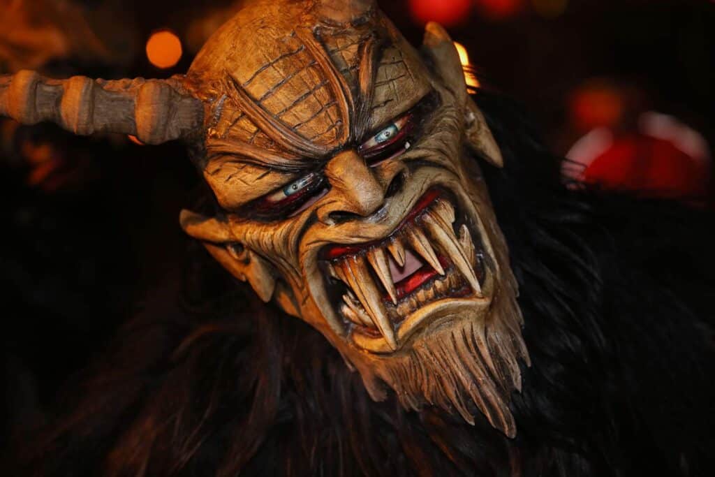 Viking demon mask with fierce expression, horns, and detailed features at St Christopher’s Berlin -.