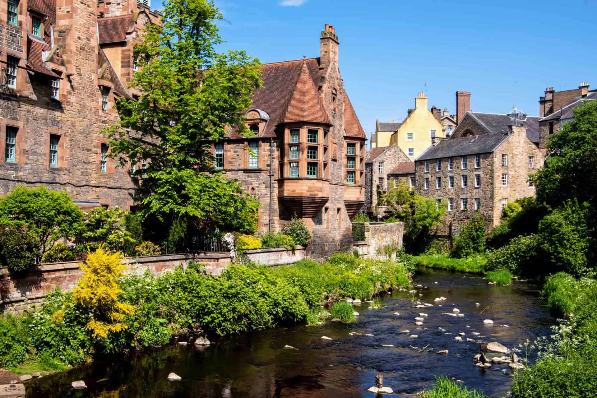 Beautiful view of historic architecture and lush greenery by the river in Berlin Mitte.