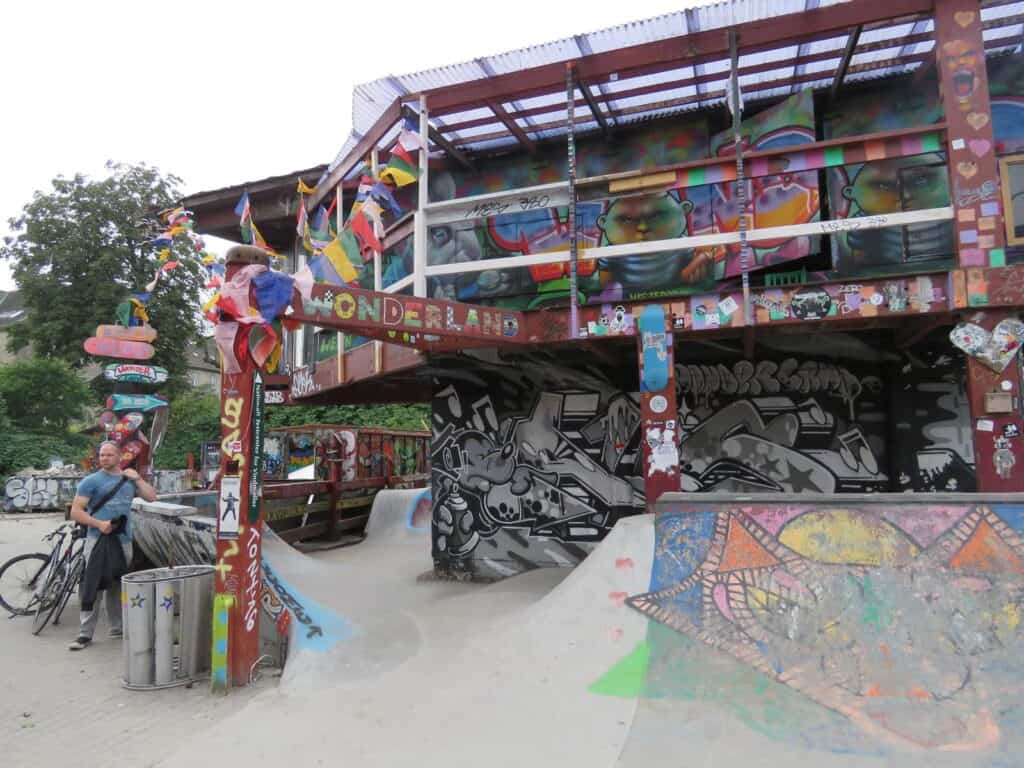 Colourful graffiti art on the exterior of Mitte Hostel in Berlin, showcasing vibrant street art and.