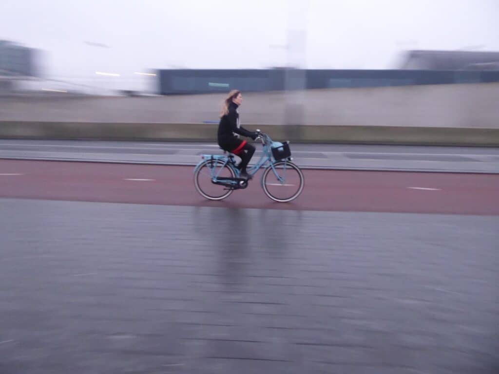 Girl on bike Amsterdam