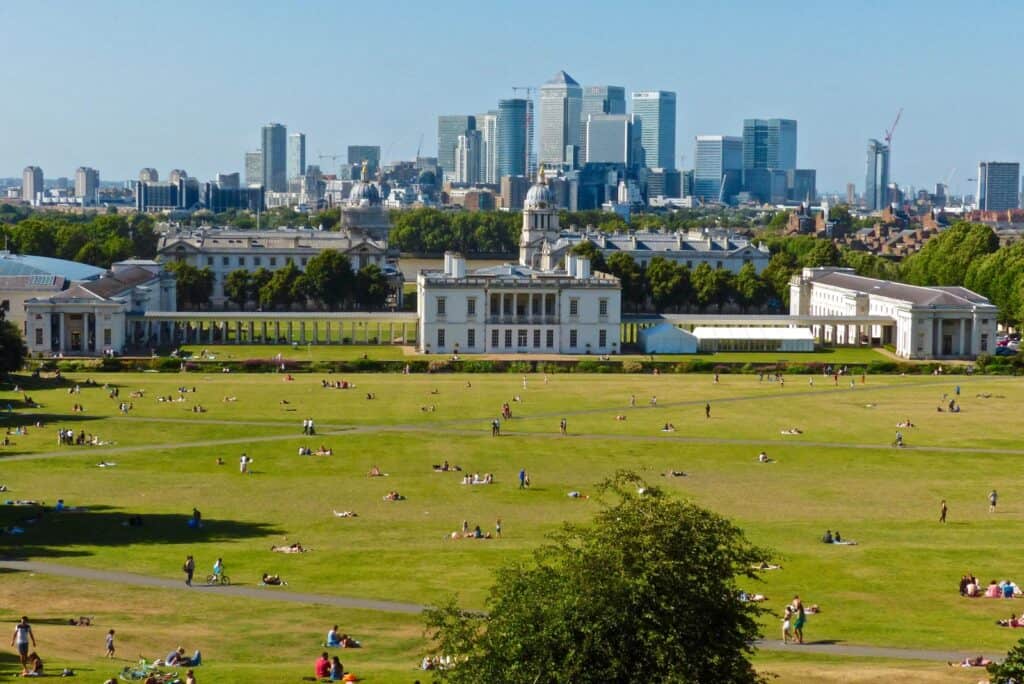 Historic Mitte Park with city skyline view.