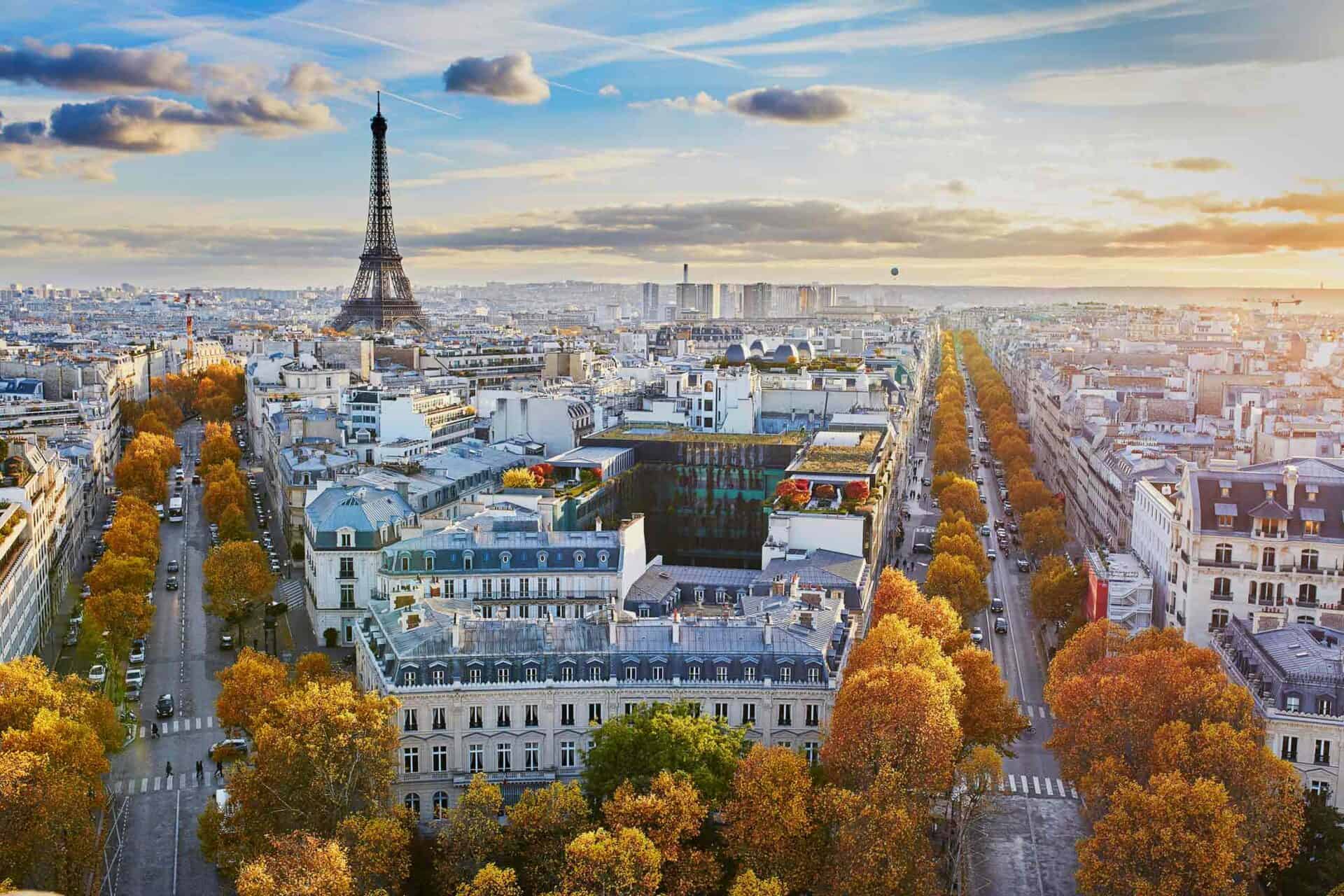 Panoramic view of Paris with Eiffel Tower and cityscape.