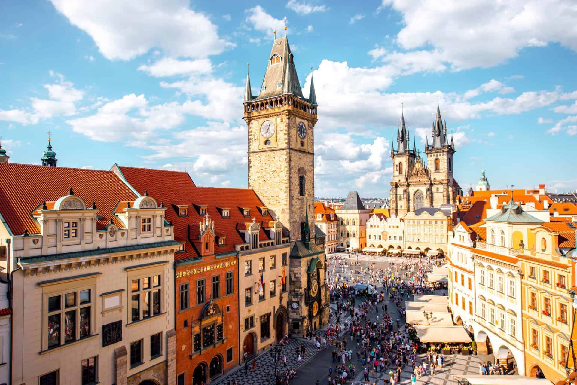 Vibrant view of Berlin's historic Mitte district featuring the famous clock tower and lively atmosph.