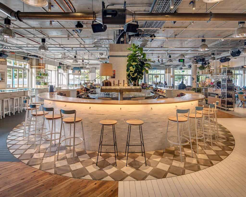 Stylish hostel bar in Berlin - Mitte with contemporary design and vibrant atmosphere.