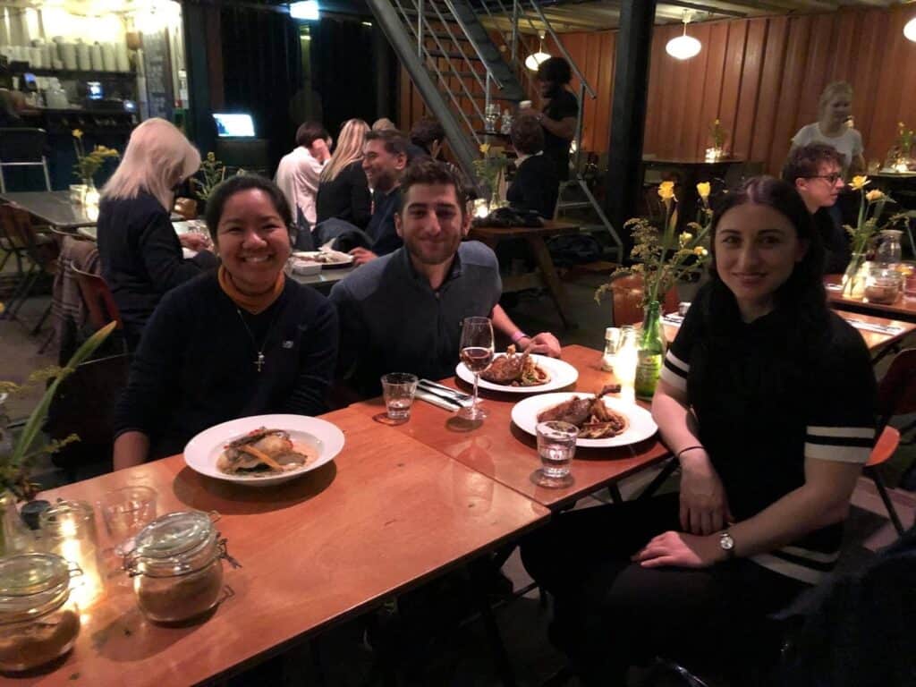 Three friends at a restaurant