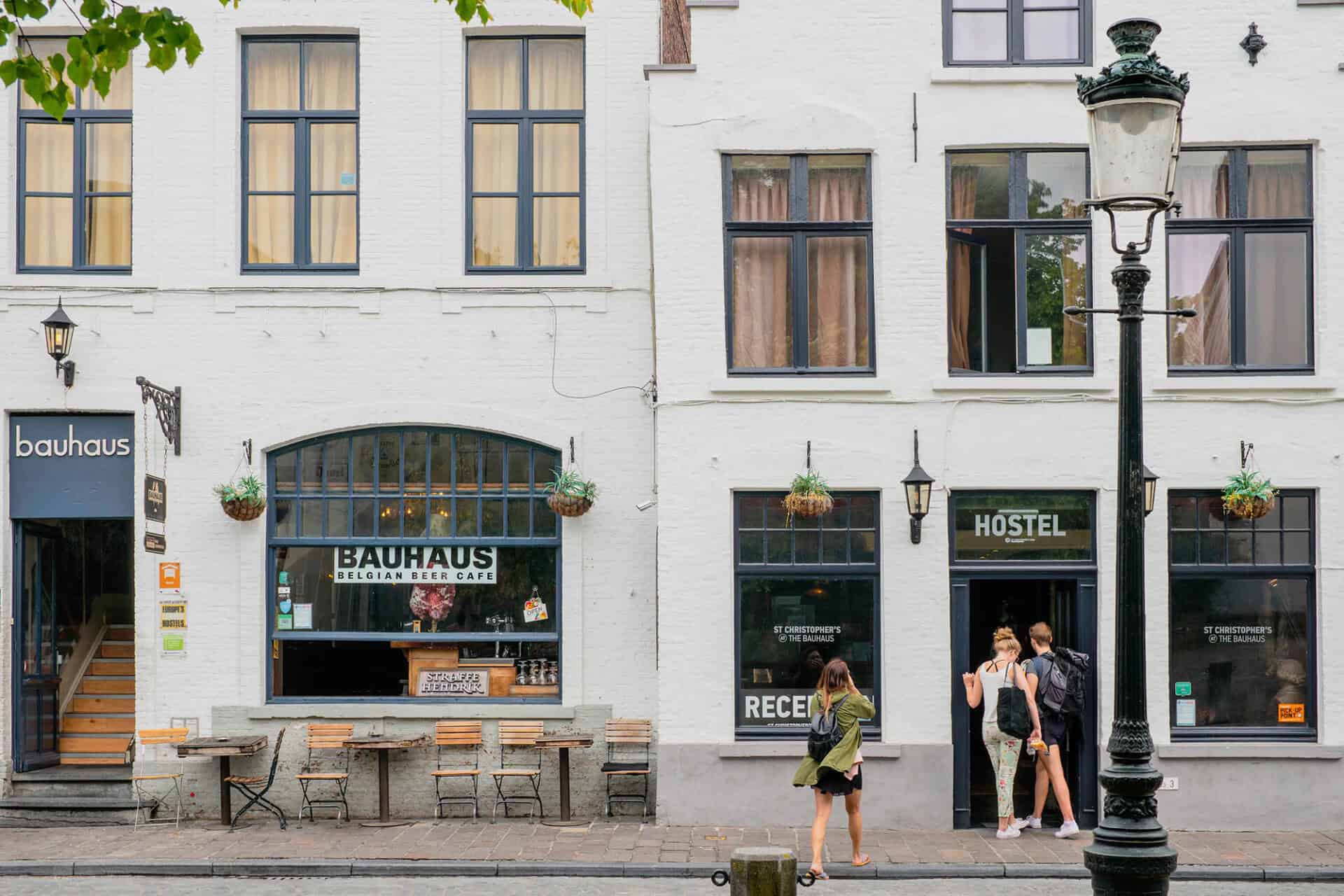 Modern Mitte hostel in Berlin with outdoor seating and vibrant city views.