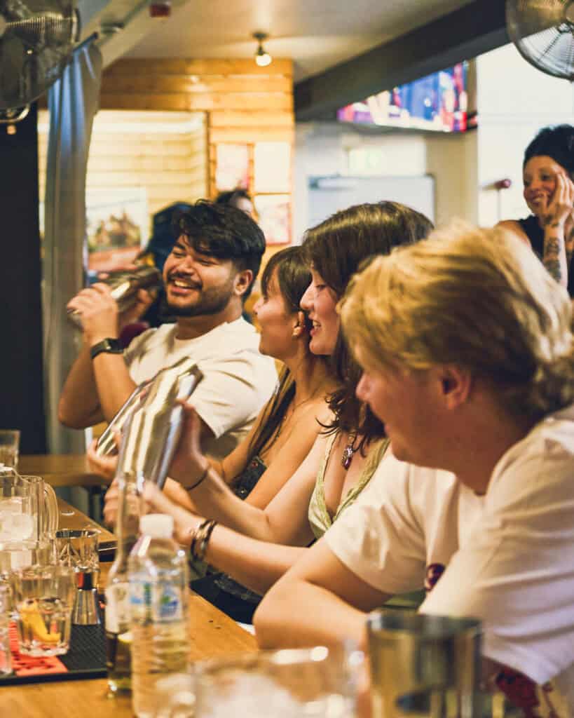 Enjoy vibrant socialising at St Christopher’s Berlin - Mitte hostel bar with diverse guests.