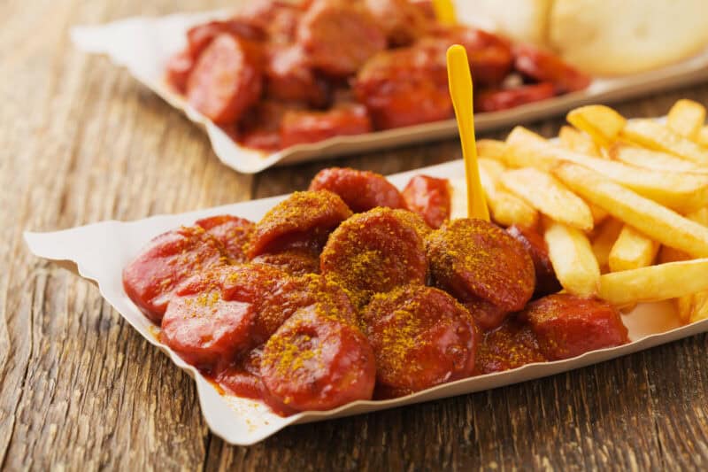 Traditional German Currywurst with fries at Mitte Hostel, Berlin.