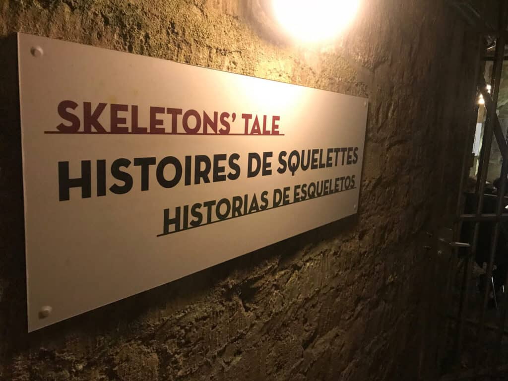 Exhibition sign for Skeletons' Tale at St Christopher’s Berlin hostel in Mitte.