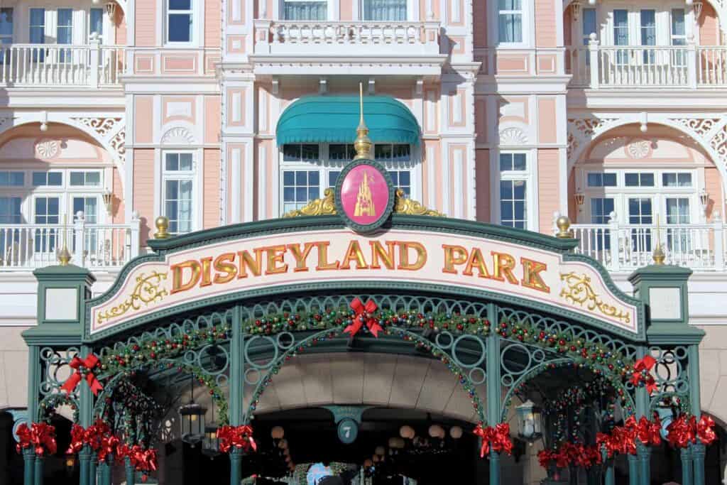 Entrance to Disneyland Park in Berlin decorated for the holidays with red bows and festive ornaments.
