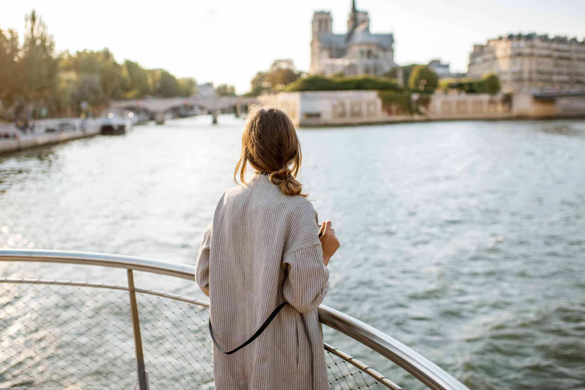 Woman enjoying view of Berlin river from boat.