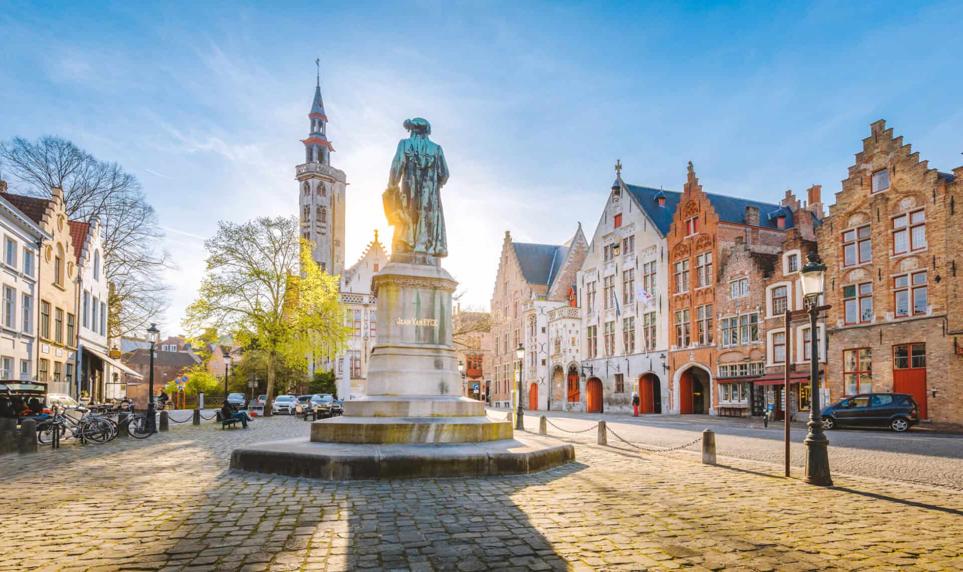 Historic Berlin square with statue and traditional architecture.