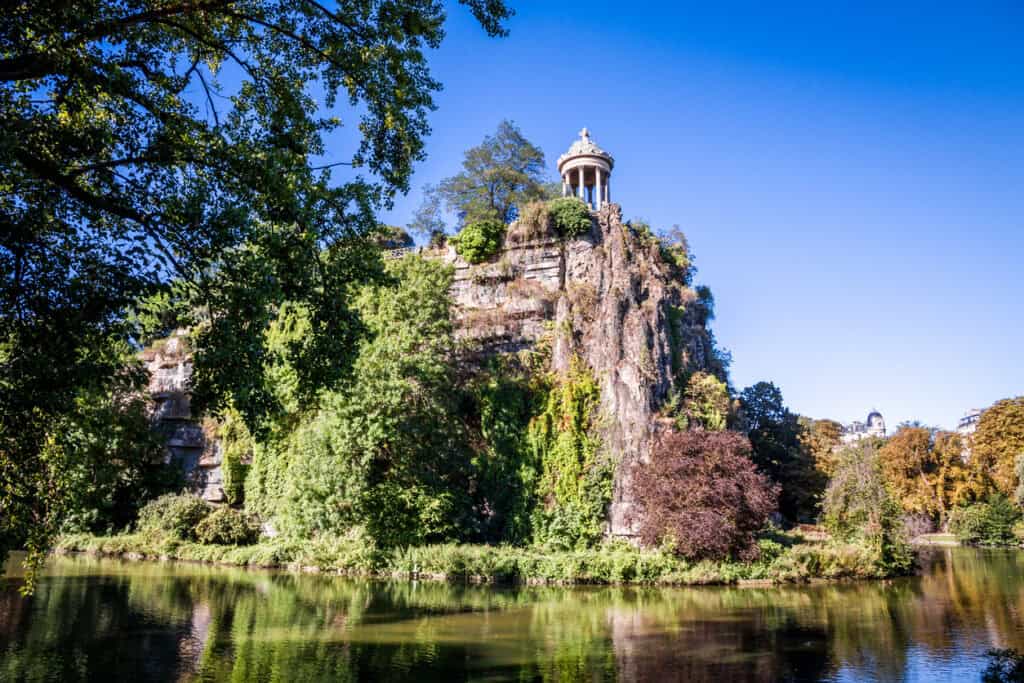 View of the historic Monbijou Park with the Monbijou Palace and lush greenery in Berlin Mitte.