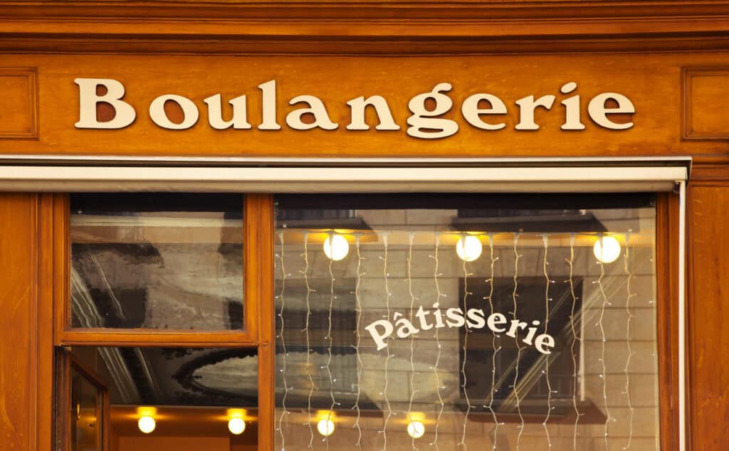 Boulangerie and Patisserie storefront in Berlin Mitte, showcasing French baked goods and pastries.