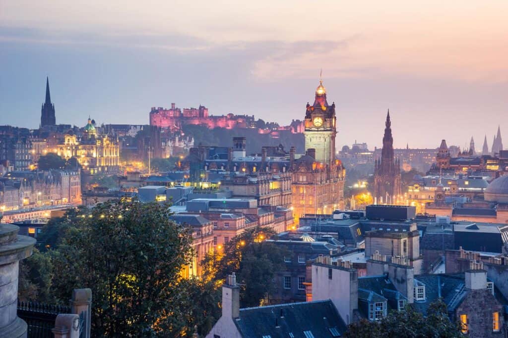 Historic Berlin skyline at dusk with iconic landmarks and illuminated cityscape.
