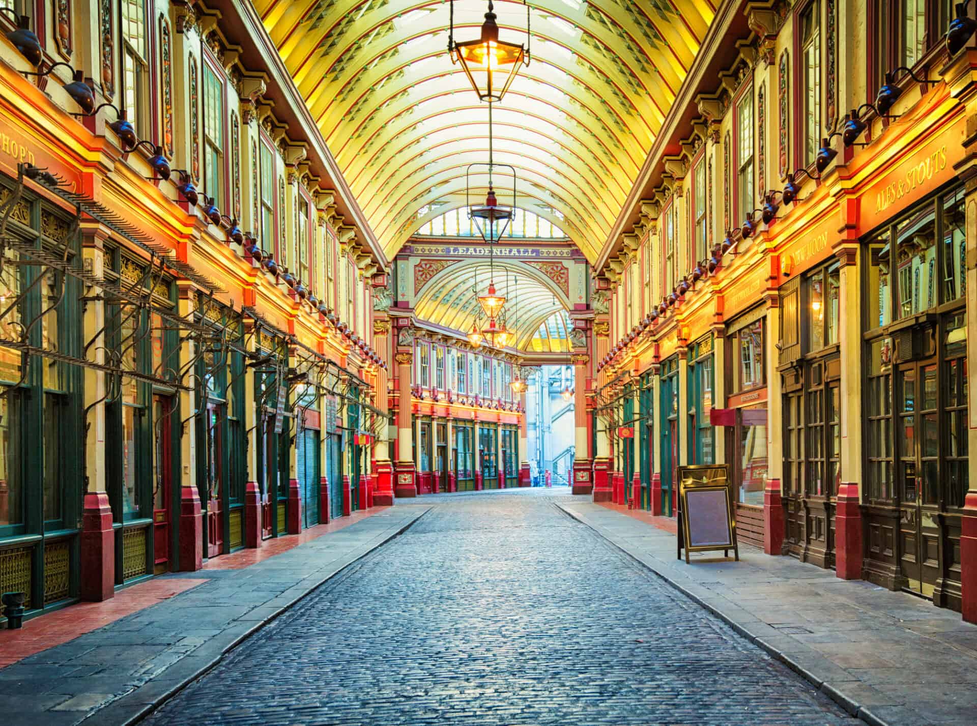 Historic arcade at Mitte Hostel, Berlin with colourful architecture and vintage charm.
