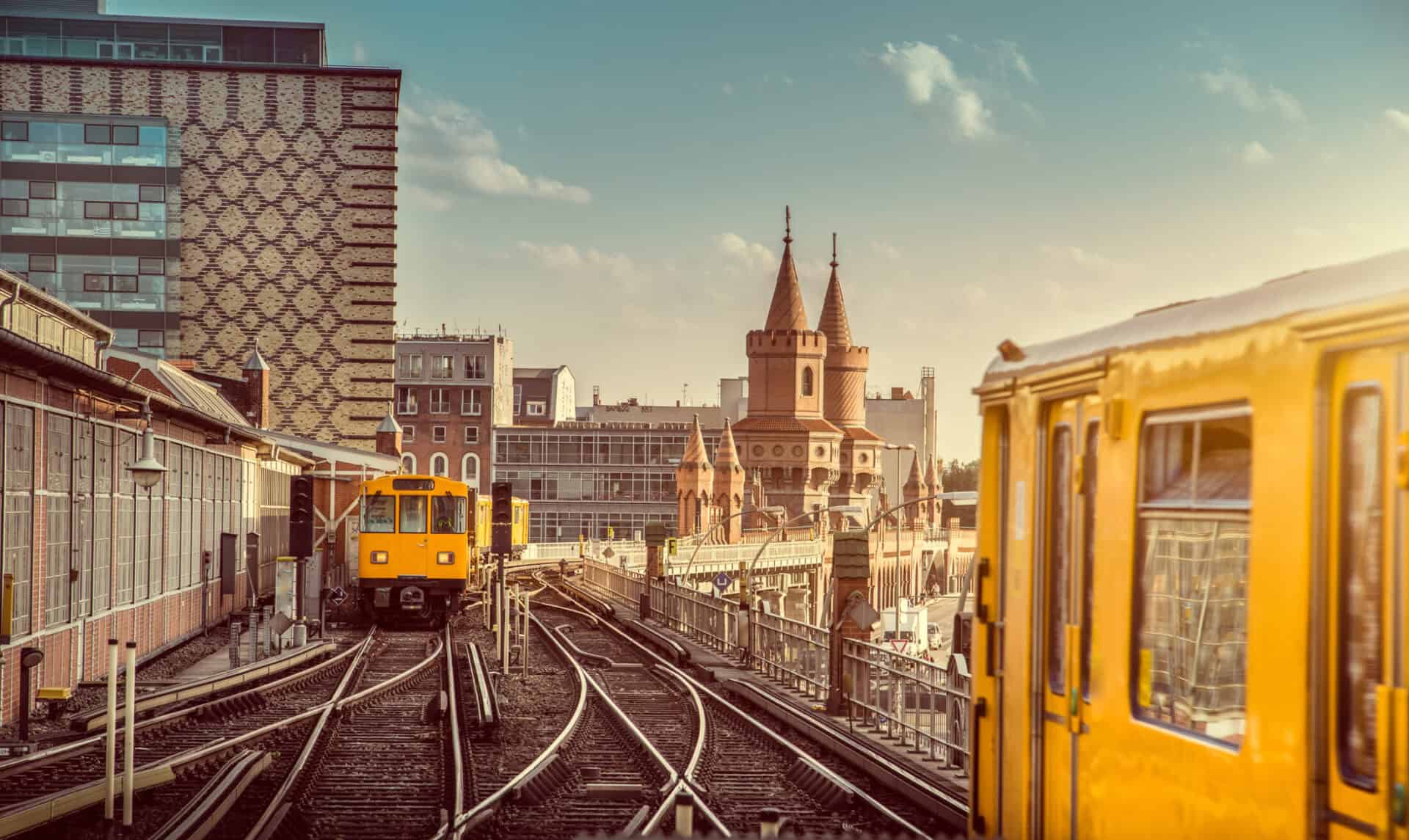 View of Berlin's Mitte district with trains and historic architecture.