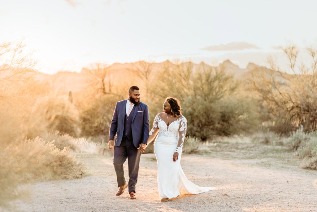 Couple surrounded by golden hour light during their Phoenix elopement, shot by Stratus Adventure Photography