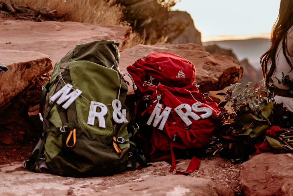 DIY Mr and Mrs signs on backpack