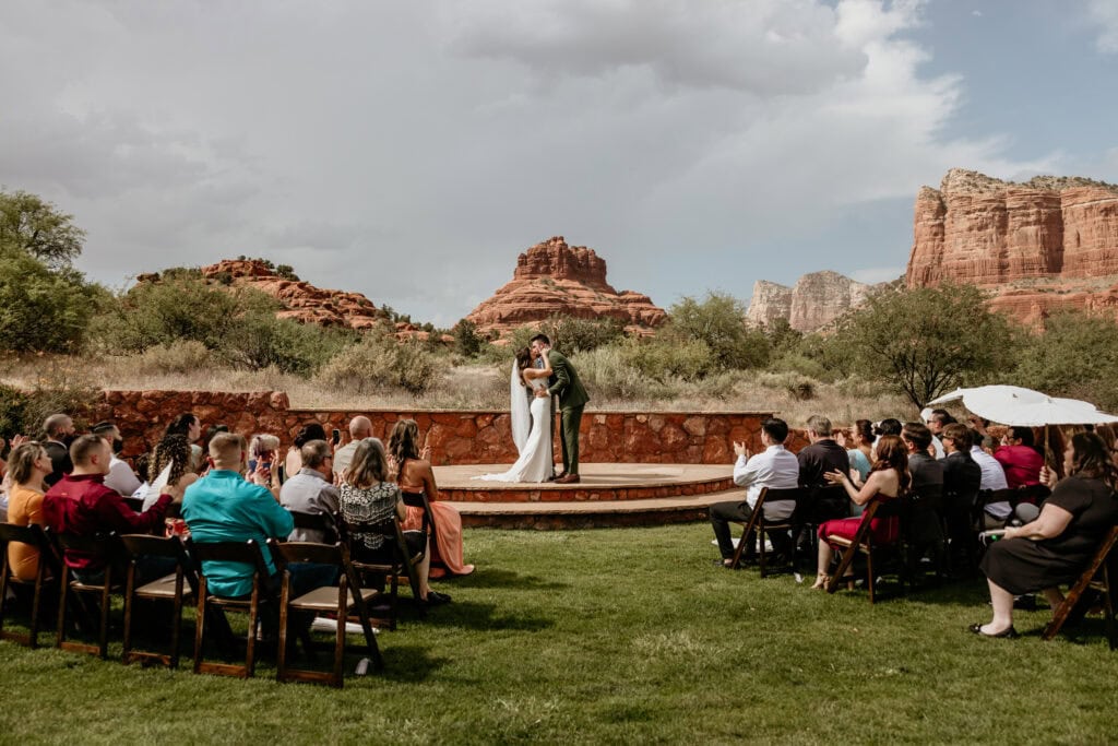 Wedding couple kissing during their Red Agave Wedding in Sedona