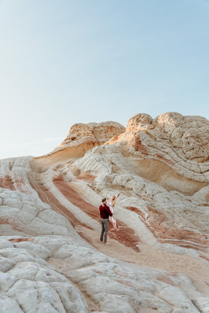 Nick spins Cassie during their Vermillion Cliffs engagement Session