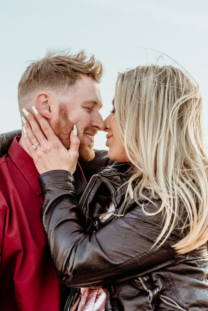 Close up of Cassie and Nick snuggling during their Vermillion Cliffs engagement Session