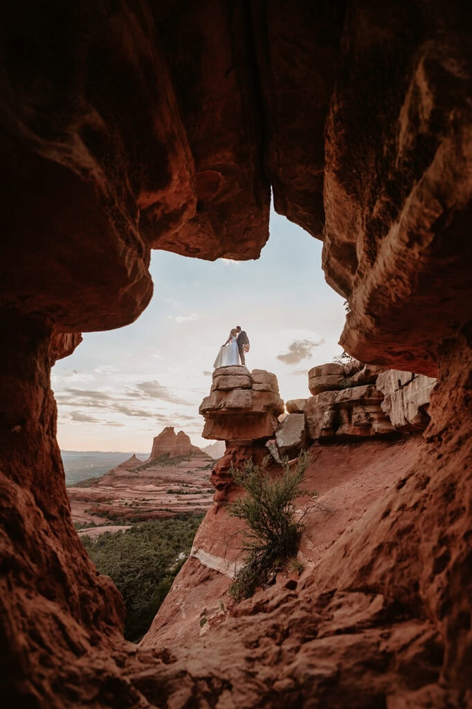 Cave shot of couple by Sedona Elopement Photographer Stratus Adventure Photography
