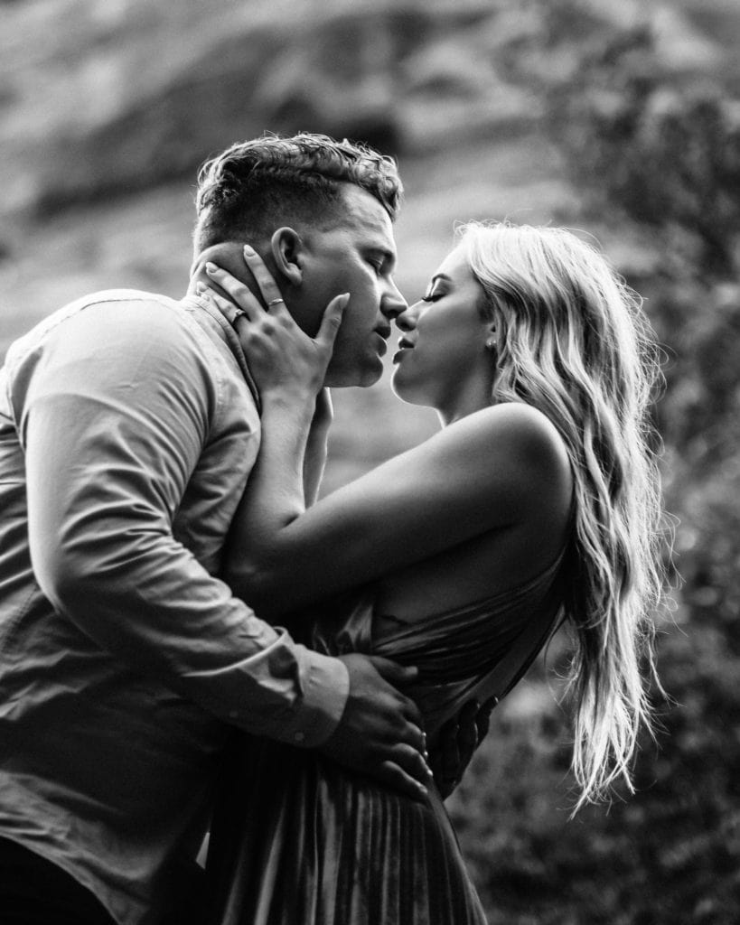 Intimate black and white image of a kiss
