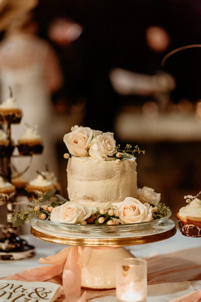 Gorgeous and delicious cake and cupcakes provided by the grooms mom