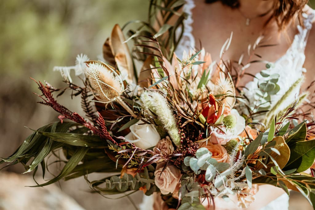 Breathtaking Bohemian wedding bouquet with earthy tones and interesting textures