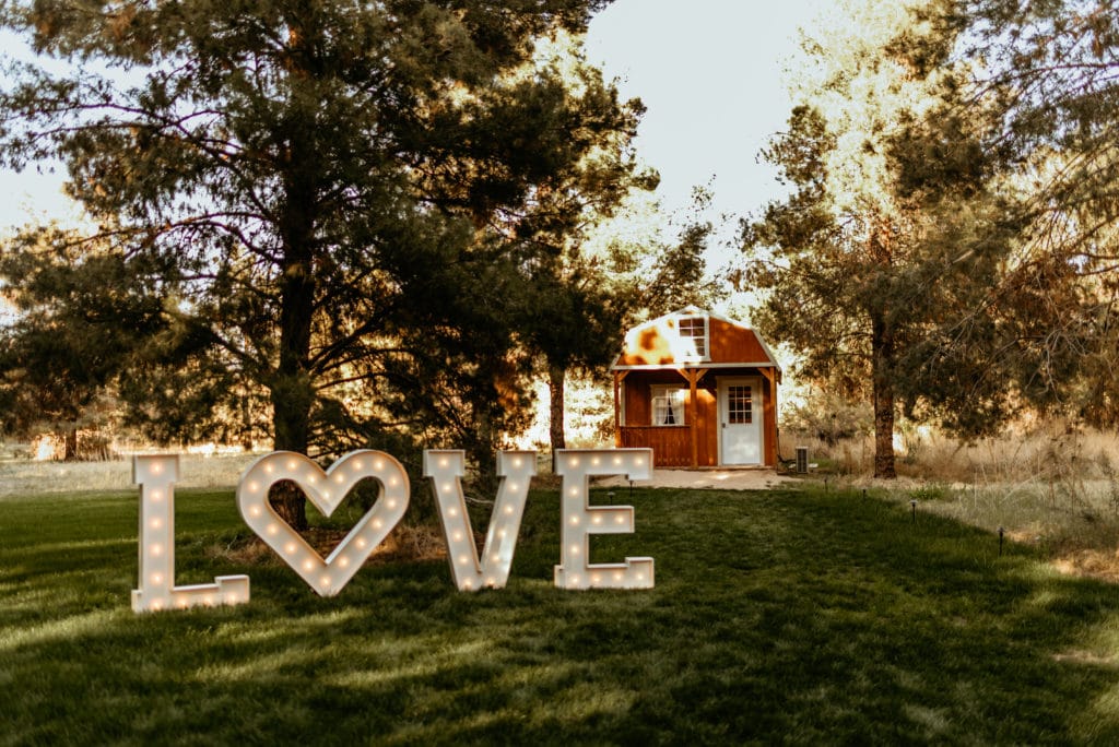 Marquee Love in front of the Schnepf Farm red barn in the meadow