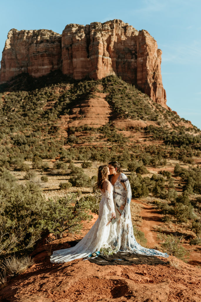 Courthouse Butte towering in the background during elopement in Sedona
